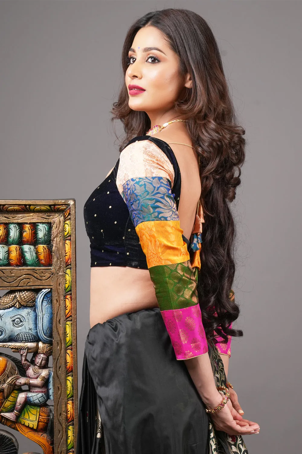 Midnight blue velvet blouse with rounded square neck and pure kanjivaram silk brocade  sleeves.