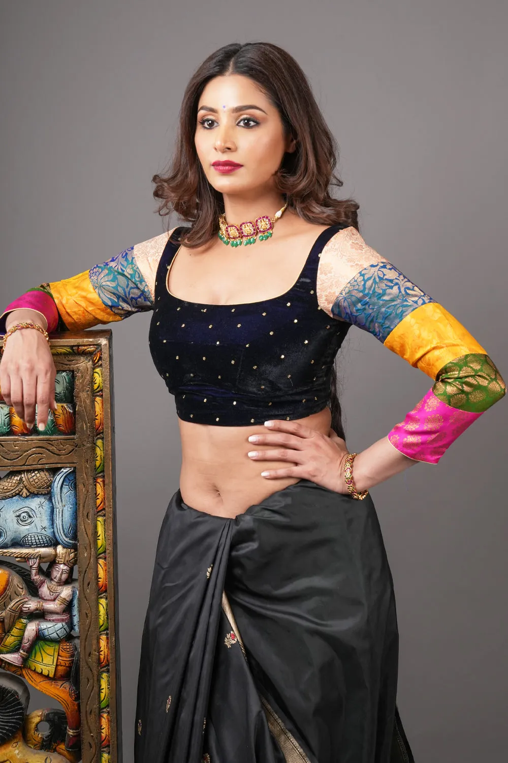 Midnight blue velvet blouse with rounded square neck and pure kanjivaram silk brocade  sleeves.